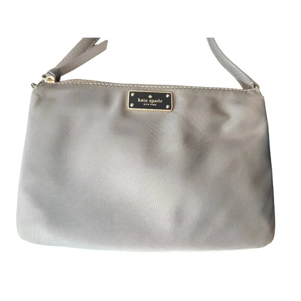 Kate Spade‎ New York gray nylon crossbody gold trim adjustable strap